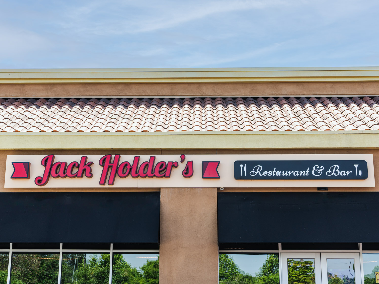 photo of outside of building jack holders restaurant and bar